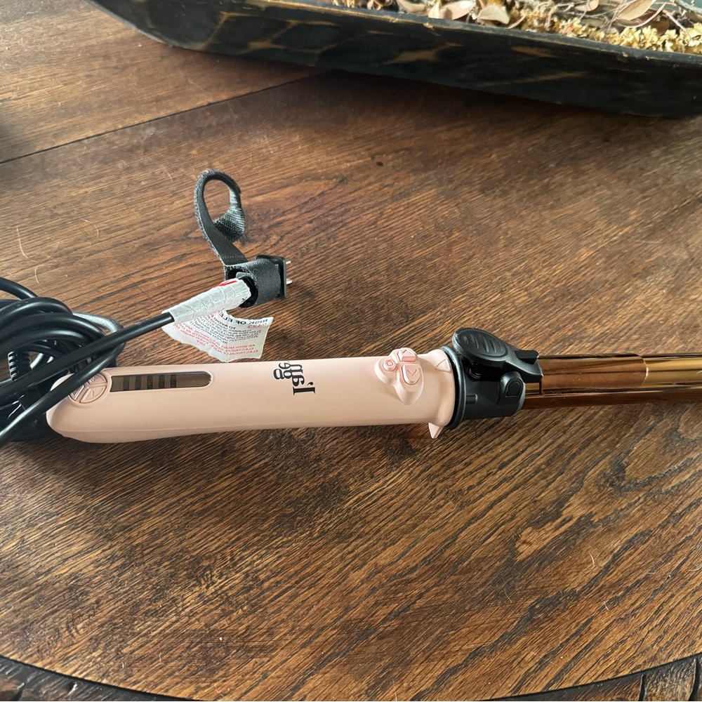Lange rotating Pink Curling Iron with Black Handle